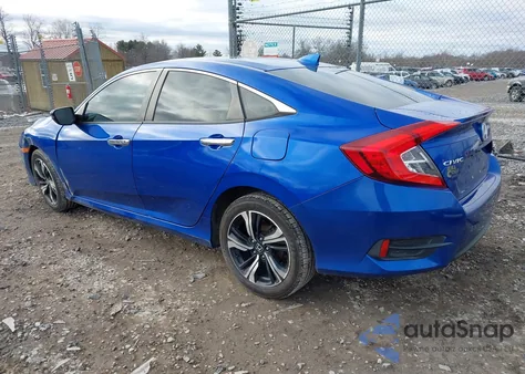 2017 Honda Civic Touring z USA, uszkodzony, nr VIN 19XFC1F9XHE000183